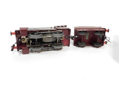 A Hornby O gauge tinplate clockwork No 501 locomotive (reversing), and tender, 0-4-0, LMS red livery, in original boxes. - 2