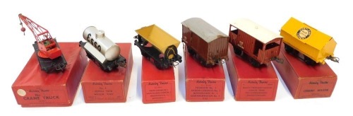 Hornby O gauge tinplate rolling stock, including No 1 petrol tank wagon Esso, No 1 crane truck, cement wagon, etc. (6)