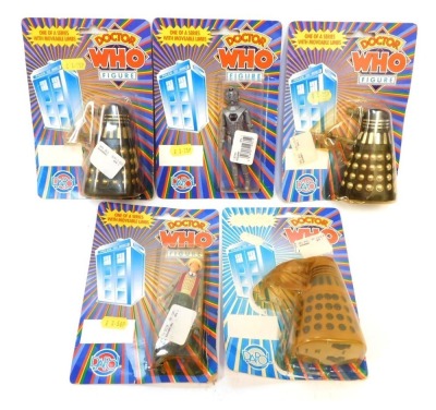 Dapol Dr Who figures, comprising The 7th Doctor in grey coat, black and silver Dalek, black and gold Dalek, grey and blue Dalek, and a Cyberman, in original blister packaging. (5)