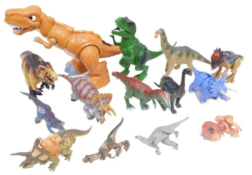 Fisher Price and other dinosaurs, including T Rex Triceratops, Pakisaurus, Brachiosaurus, etc. (1 box)