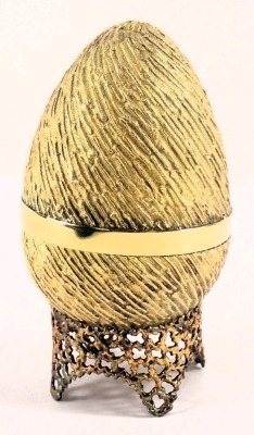 A Stuart Devlin silver parcel gilt Kangaroo and Sprung Joey egg, London 1974, with unmarked silver gilt coloured stand, 6.93oz, 7cm high, boxed with certificate. - 2