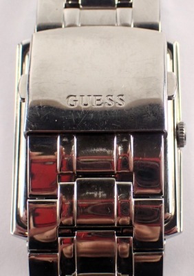 A Guess gent's stainless steel wristwatch, with a blackened Roman numeric dial, 2.5cm x 3.5cm, on stainless steel strap. - 4