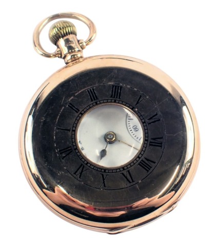 A 9ct gold half hunter Waltham pocket watch, the outer case with black enamel Roman numeric border, opening to reveal a white enamel with silvered hands, seconds dial with blue hand and bezel wind, stamped ALD, Birmingham 1924, 95.7g all in.