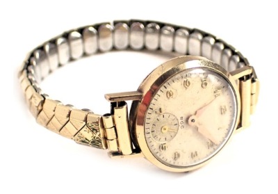 A ROC 9ct gold cased lady's wristwatch, with small circular watch head, on silvered dial, on expanding stainless steel and plated strap, 14.7g all in.