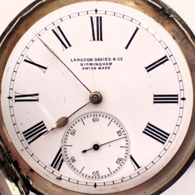 A silver cased pocket watch with white enamel dial, stamped The Express English Lever retailed by JG Greaves of Sheffield, Chester hallmarks, and a white metal pocket watch, retailed by Langdon Davis and Co Birmingham, Swiss made movement and case. (2) - 6