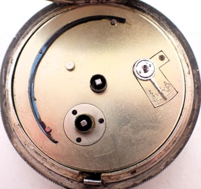 A silver cased pocket watch with white enamel dial, stamped The Express English Lever retailed by JG Greaves of Sheffield, Chester hallmarks, and a white metal pocket watch, retailed by Langdon Davis and Co Birmingham, Swiss made movement and case. (2) - 7