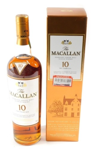 A bottle of the Macallan Highland single malt scotch whisky, aged ten years, boxed.