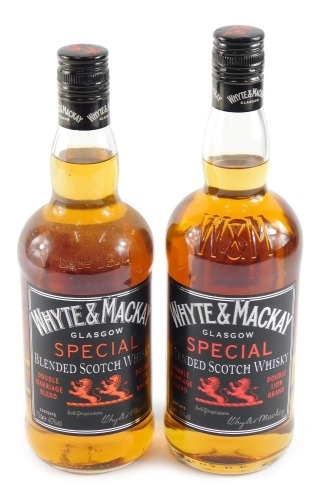 Two bottles of Whyte and Mackay Glasgow special blended scotch whisky, 70cl.