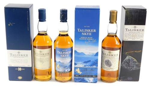 Three bottles of Talisker Isle of Skye malt whisky, one aged ten years.