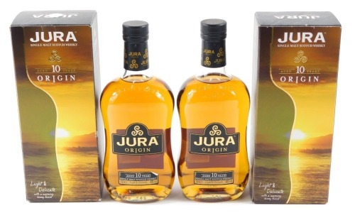 Two bottles of Jura single malt scotch whisky, aged ten years, origin.