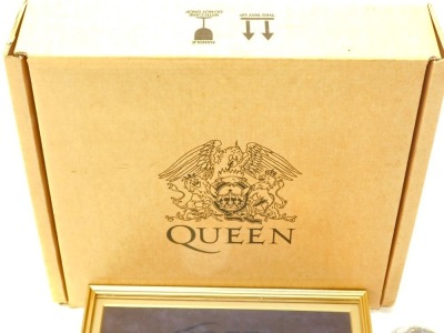 A limited edition boxed set of Queen compact discs, with accompanying frame, instructions, etc., number 003112. - 2