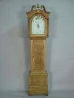 A 19thC oak and mahogany longcase clock