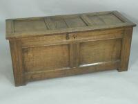 A late 17thC panelled oak coffer