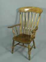 A 19thC lathe back Windsor armchair