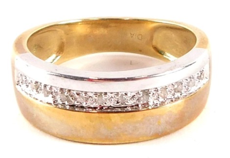 A 9ct gold dress ring, of bicolour design, set with single panel of tiny diamonds, ring size R½, 4.9g all in.