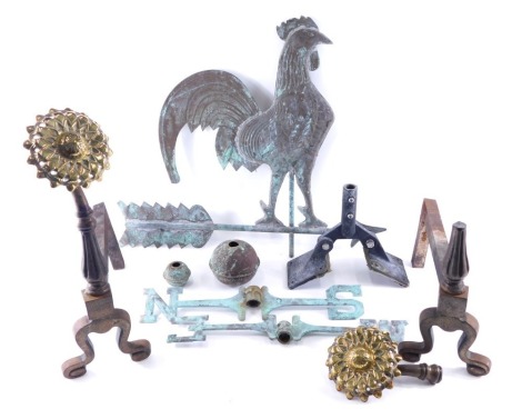 A pair of 19thC fireside andirons, with brass sunflower clasp and partial weather vane. (AF)