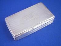 A George IV silver snuff box with engine turned decoration and gilt interior