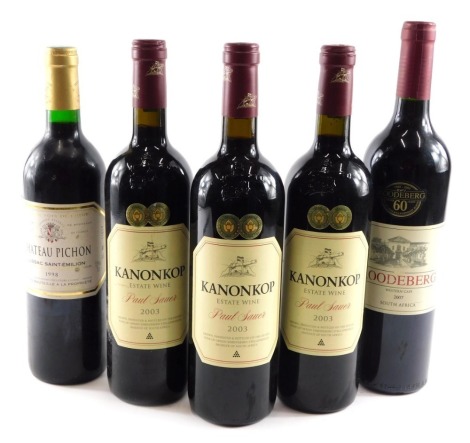 Three bottles of Paul Sauer Kanonkop Estate wine, and a bottle of Chateau Pichon 1998, and another bottle. (5)