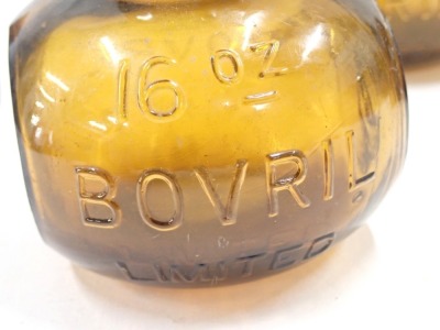 Bovril jars, from 16oz to 4oz, comprising six jars, brown ground, the largest 12cm high, the smallest 8cm high, 37cm long overall. - 2