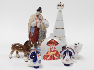 A group of USSR pottery and porcelain, including Lomonosov figures and a decanter, lacquered cup and cover, and a two tile framed plaque of the domes of the Kremlin. (a quantity) - 4