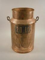 A copper and brass milk churn bearing a label for 20 litres