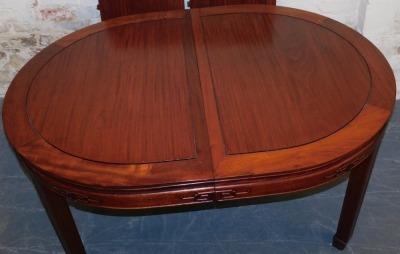 A Chinese hardwood oval dining table, with two additional leaves, raised on square legs and spade feet, 77cm high, 152cm wide, 244cm extended, 112cm deep, together with eight dining chairs, with loose cushion seats, comprising a pair of carvers and six si - 3