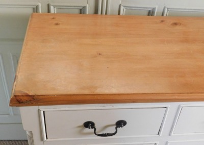 A modern pine and cream painted sideboard, the top with a moulded edge above four short drawers above two longer drawers flanked by panelled cupboards, on bracket feet, 92cm high, 176cm wide, 46cm deep. - 3