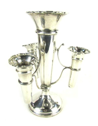 An Edward VII loaded silver epergne, the central trumpet with three branches supporting three smaller trumpets, on outswept circular foot, Robert Pringle and Sons, London 1901, 16.84oz gross, 21.5cm high.