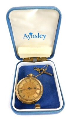 A lady's pocket watch, open faced, key wind, the floral engraved dial with black enamel Roman numerals and blue hands, in a florally engraved case, with vacant shield reserve, key wind and safety chain, yellow metal, stamped 18k, 34.3g all in.