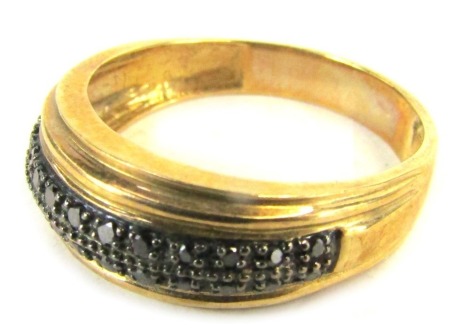 A 9ct gold half hoop dress ring, with two row lacquered finish stones, in claw setting, on a yellow metal band, 3.1g all in.