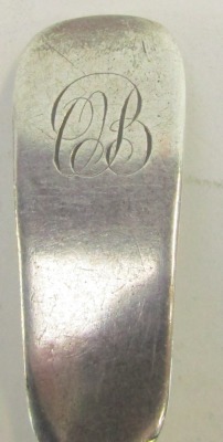 A Victorian Fiddle pattern serving spoon, bearing the initials C B, white metal with faint markings, 1.30oz. - 3