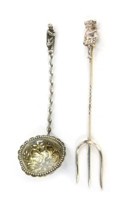 A George V silver fork, with Lincoln Imp terminal, possibly Birmingham 1946, together with a Victorian silver sifter spoon, the pierced bowl with raised bead decoration, twisted handle with apostle terminal, London 1879, 1.41oz.