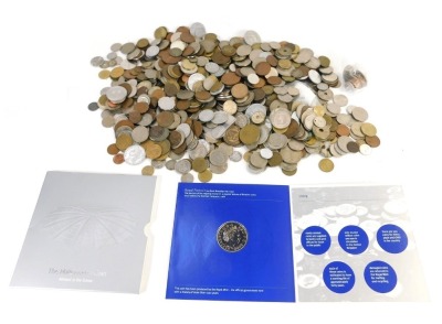 World coinage, to include French, Greek, Irish, together with a Royal Mint commemorative millennium coin, contained in a tin.