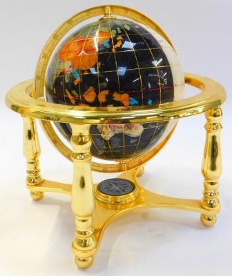 A hardstone set terrestial globe, in brass gimbal stand, the base set with a compass, 24cm high. - 2