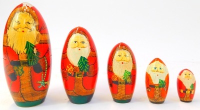 Two Russian Matryoshka nesting dolls, comprising doll depicting Father Christmas, the largest 14cm high, the other decorated with biblical figures, 18cm high. - 4