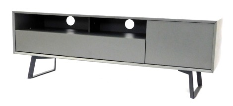 An Alphason Carbon television cabinet, the rectangular top above a fall enclosing a shelf flanked by a cupboard, in grey, on metal U shaped supports, serial number ADCA1600, with instruction manual, 54cm high, 161cm wide, 37cm deep.