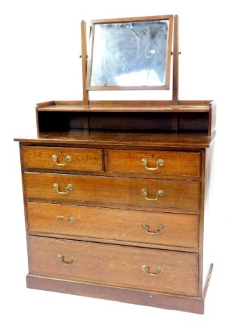 A 20thC oak mirror back dressing chest, stamped Gillows, the rectangular swing frame mirror above a shelf with recess, the base with two short over three long drawers, on a plinth base, 156cm high, 107cm wide, 48cm deep.