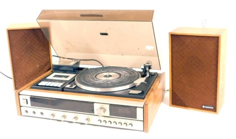 A Sanyo turntable, together with a pair of Sanyo teak cased speakers. WARNING! This lot contains untested or unsafe electrical items. It is supplied for scrap or re-conditioning only. TRADE ONLY