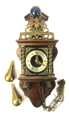 A Dutch Zaandam mahogany stoelklok wall clock, with pendulum and weights, 46cm high.