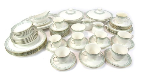 A Royal Doulton porcelain Berkshire pattern part tea and dinner service, to include teacups and saucers, two tureens and covers, oval serving plates, sugar bowl, milk jug, gravy boat, dinner plates, side plates, etc.