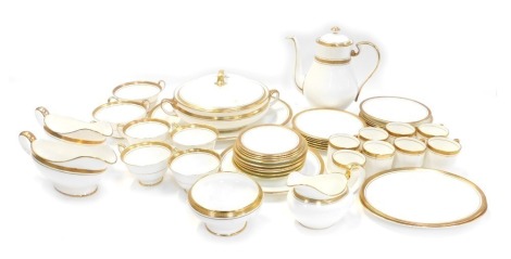 An Aynsley porcelain Elizabeth pattern part tea, dinner and coffee service, to include two handled tureen and cover, coffee pot, coffee cans and saucers, two gravy boats, teacups and saucers, oval serving plate, etc.