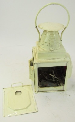 A cream painted railway lantern, 40cm high. - 2