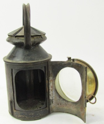 A black painted metal SER railway lantern, 30cm high. - 2