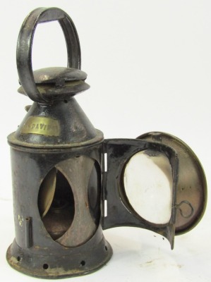 A black painted railway lantern, bearing brass plaque for JT Davies, 29cm high. - 2