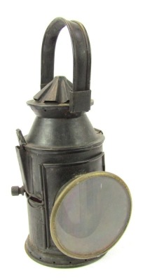 A black painted railway lantern, 38cm high.