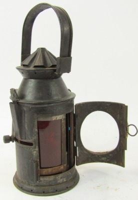 A black painted railway lantern, 38cm high. - 2