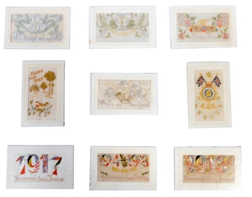 Nine early 20thC silk postcards, to include 1918 souvenir from France, 1917 Souvenir from France, How I Miss You, To My Boy, etc., contained in a framed display measuring 50cm x 59cm.