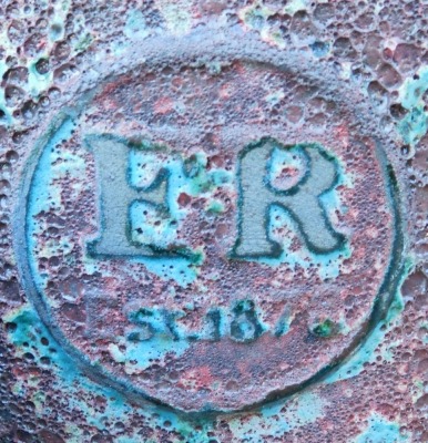 A pair of garden planters, of circular form, in burgundy with reactive blue glaze, each bearing a roundel with the initials ER, 39cm high, together with a further plant pot. - 3