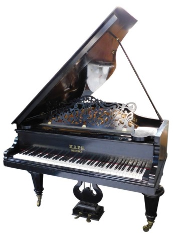 A mid century Kaps Dresden ebonised baby grand piano, no 8639, with original bill of purchase dated 3rd May 1948, ivory keys, 97cm high, 137cm wide, 169cm deep.  