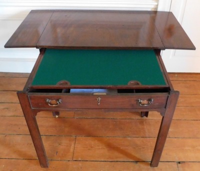 A George III mahogany architect's table, the rectangular top with drop leaves, with pull out front section of a false drawer with baize lined sliding interior revealing recesses on brass castors, 84cm high, 93cm wide, each drop leaf section 24cm, 66.5cm d - 3